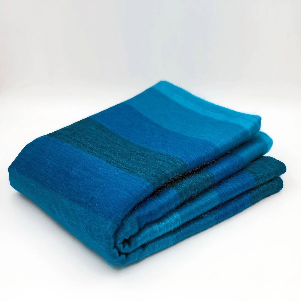 ECUALAMA Alpakadecke mit blau-türkisen Streifen